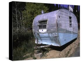 Old Camper at a Car Cemetery in Colorado-Michael Brown-Stretched Canvas