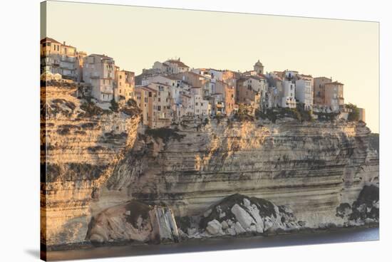 Old citadel townhouses and church at dawn, in early morning light, seen from the sea, Bonifacio, Co-Eleanor Scriven-Stretched Canvas