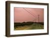 Old Curved Road through Deserted Coastline at Sunset under a Soft Pink Sky-Sanghwan Kim-Framed Photographic Print