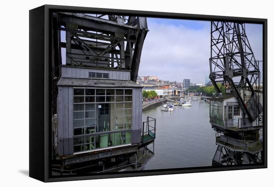 Old Dockside Cranes Frame the Harbour, Bristol, England, United Kingdom, Europe-Rob Cousins-Framed Stretched Canvas