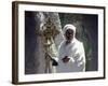 Old Ethiopian Orthodox Priest Holds a Large Brass Coptic Cross at Rock-Hewn Church of Adadi Maryam-Nigel Pavitt-Framed Photographic Print