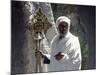 Old Ethiopian Orthodox Priest Holds a Large Brass Coptic Cross at Rock-Hewn Church of Adadi Maryam-Nigel Pavitt-Mounted Photographic Print