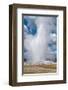 Old Faithful erupts Yellowstone-null-Framed Art Print