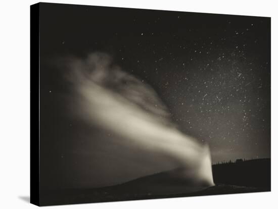 Old Faithful Geyer after Dark at Yellowstone National Park-Rebecca Gaal-Stretched Canvas