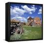 Old Farm Wagon and Derelict Wooden and Brick Houses at Bodie Ghost Town, California, USA-Tony Gervis-Framed Stretched Canvas