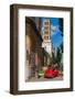 Old Fiat 500 car parked with Basilica dei Santi Bonifacio ed Alessio in the background, Rome, Lazio-Stefano Politi Markovina-Framed Photographic Print