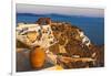 Old fortress and houses on the coast of Aegean Sea. Oia, Santorini Island, Greece.-Keren Su-Framed Photographic Print