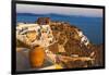 Old fortress and houses on the coast of Aegean Sea. Oia, Santorini Island, Greece.-Keren Su-Framed Photographic Print