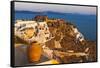 Old fortress and houses on the coast of Aegean Sea. Oia, Santorini Island, Greece.-Keren Su-Framed Stretched Canvas