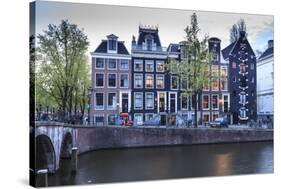 Old Gabled Houses Line the Keizersgracht Canal at Dusk, Amsterdam, Netherlands, Europe-Amanda Hall-Stretched Canvas