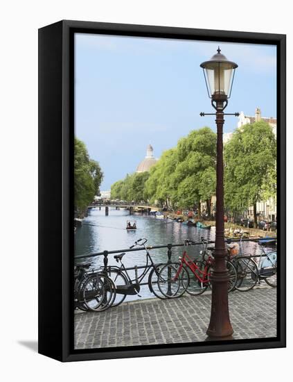 Old Gas Lamp Post and Bicycles on a Bridge over a Canal in Amsterdam, the Netherlands-Miva Stock-Framed Stretched Canvas