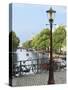 Old Gas Lamp Post and Bicycles on a Bridge over a Canal in Amsterdam, the Netherlands-Miva Stock-Stretched Canvas