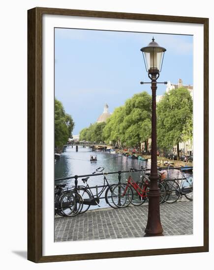 Old Gas Lamp Post and Bicycles on a Bridge over a Canal in Amsterdam, the Netherlands-Miva Stock-Framed Premium Photographic Print