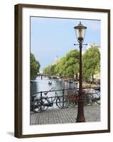 Old Gas Lamp Post and Bicycles on a Bridge over a Canal in Amsterdam, the Netherlands-Miva Stock-Framed Premium Photographic Print