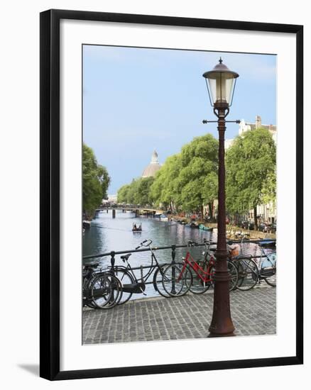 Old Gas Lamp Post and Bicycles on a Bridge over a Canal in Amsterdam, the Netherlands-Miva Stock-Framed Premium Photographic Print