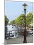 Old Gas Lamp Post and Bicycles on a Bridge over a Canal in Amsterdam, the Netherlands-Miva Stock-Mounted Premium Photographic Print