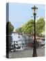 Old Gas Lamp Post and Bicycles on a Bridge over a Canal in Amsterdam, the Netherlands-Miva Stock-Stretched Canvas