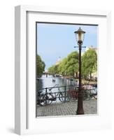 Old Gas Lamp Post and Bicycles on a Bridge over a Canal in Amsterdam, the Netherlands-Miva Stock-Framed Photographic Print