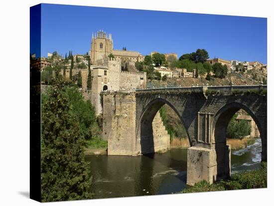 Old Gateway Bridge over the River and the City of Toledo, Castilla La Mancha, Spain, Europe-Nigel Francis-Stretched Canvas