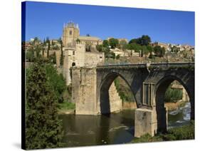 Old Gateway Bridge over the River and the City of Toledo, Castilla La Mancha, Spain, Europe-Nigel Francis-Stretched Canvas