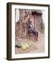 Old Haitian Woman in Front of Her Hut-Lynn Pelham-Framed Photographic Print