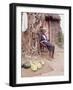 Old Haitian Woman in Front of Her Hut-Lynn Pelham-Framed Photographic Print