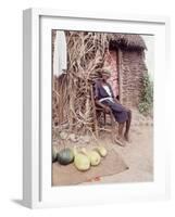 Old Haitian Woman in Front of Her Hut-Lynn Pelham-Framed Photographic Print