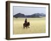 Old Himba Woman, Upright Despite Her Years, Rides Her Donkey Through Harsh Land-Nigel Pavitt-Framed Photographic Print