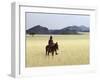 Old Himba Woman, Upright Despite Her Years, Rides Her Donkey Through Harsh Land-Nigel Pavitt-Framed Photographic Print