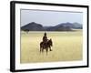 Old Himba Woman, Upright Despite Her Years, Rides Her Donkey Through Harsh Land-Nigel Pavitt-Framed Photographic Print