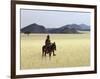 Old Himba Woman, Upright Despite Her Years, Rides Her Donkey Through Harsh Land-Nigel Pavitt-Framed Photographic Print