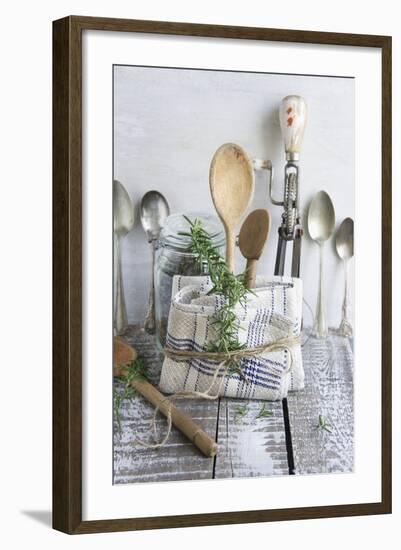 Old Kitchen Utensils: Spoons, Beater, Wooden Spoon and Linen Dish Towel-Martina Schindler-Framed Photographic Print