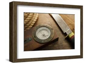 Old Knife, Compass, and Rope on a Old Wooden Desk, Exploration, Survival, and Hunting Concept Image-landio-Framed Photographic Print