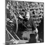 Old Lady at a Time Worn Wheel Winding Strands for Tapestries at Aubusson, France June 1946-David Scherman-Mounted Photographic Print