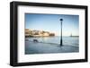 Old lantern in the Venetian harbour of Chania with lighthouse in background, Crete-Roberto Moiola-Framed Photographic Print