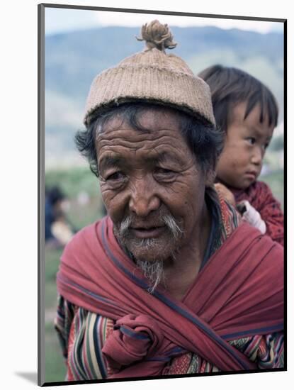 Old Man Carrying Child, Bhutan-Sybil Sassoon-Mounted Photographic Print