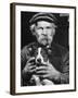 Old Man Holding His Hands around a Dog's Throat-Dmitri Kessel-Framed Photographic Print