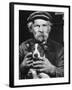 Old Man Holding His Hands around a Dog's Throat-Dmitri Kessel-Framed Photographic Print