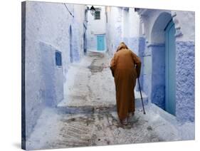 Old Man Walking in a Typical Street in Chefchaouen, Rif Mountains Region, Morocco-Levy Yadid-Stretched Canvas