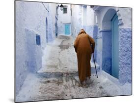 Old Man Walking in a Typical Street in Chefchaouen, Rif Mountains Region, Morocco-Levy Yadid-Mounted Photographic Print