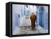 Old Man Walking in a Typical Street in Chefchaouen, Rif Mountains Region, Morocco-Levy Yadid-Framed Stretched Canvas