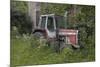 Old Massey Ferguson 698T Tractor Outside Farm Building, Norfolk, UK, June 2014-Ernie Janes-Mounted Photographic Print