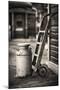 Old Milk Can with a Hand Barrows at a Train Station-George Oze-Mounted Photographic Print