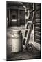 Old Milk Can with a Hand Barrows at a Train Station-George Oze-Mounted Photographic Print