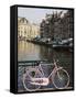 Old Pink Bicycle by the Herengracht Canal, Amsterdam, Netherlands, Europe-Amanda Hall-Framed Stretched Canvas