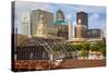 Old Railroad Station framing view of Des Moines skyline, capital of Iowa-null-Stretched Canvas