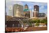 Old Railroad Station framing view of Des Moines skyline, capital of Iowa-null-Stretched Canvas