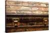 Old steamer trunk covered with stickers of various destinations.-Julien McRoberts-Stretched Canvas