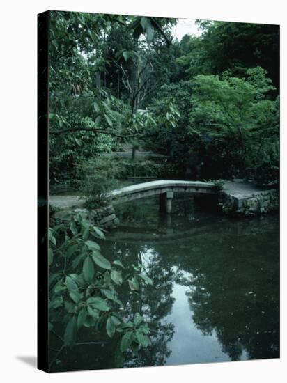 Old Stone Bridge in Garden-Ted Thai-Stretched Canvas