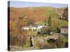 Old Stone Packhorse Bridge Over Watendlath Beck with Dry Stone Wall and Farm Buildings-Pearl Bucknall-Stretched Canvas